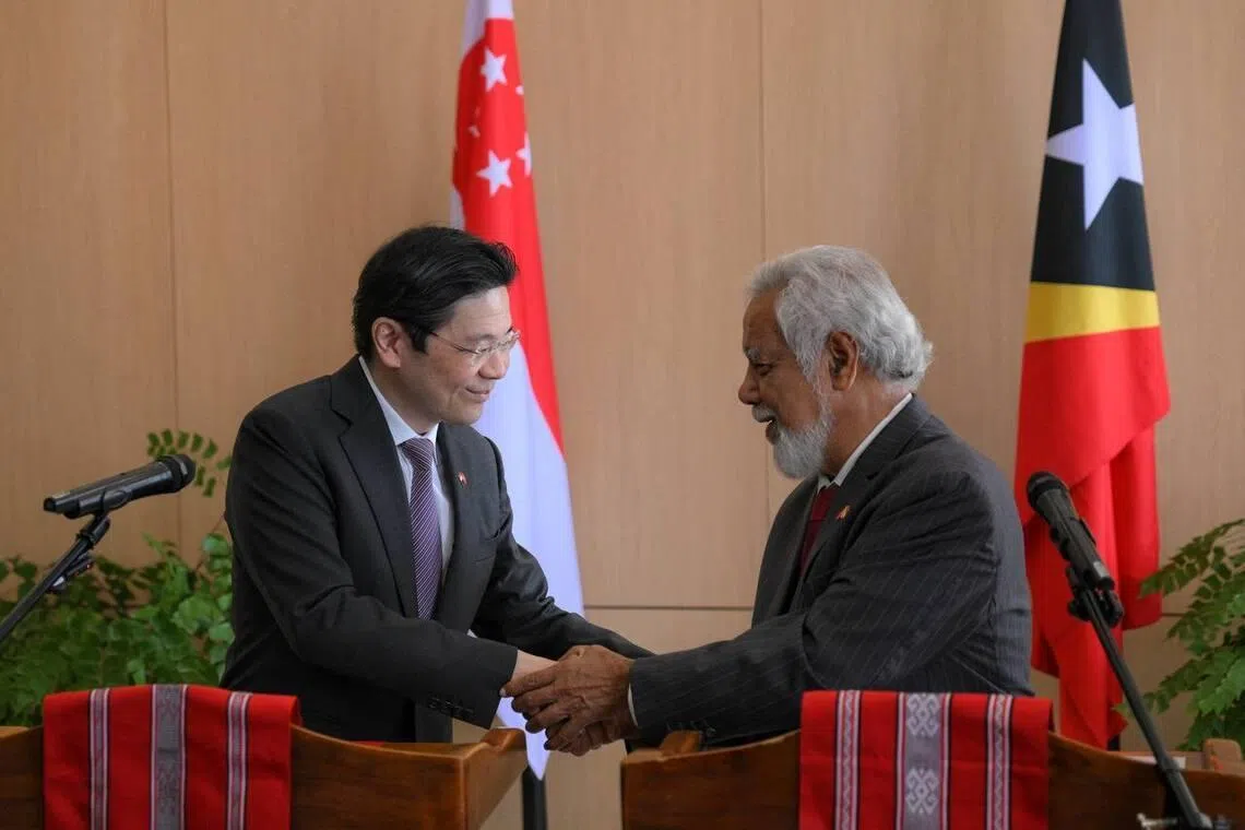 Prime Minister Lawrence Wong (left) and Timor-Leste Prime Minister Xanana Gusmao shaking hands during a joint press conference in Dili on July 3.