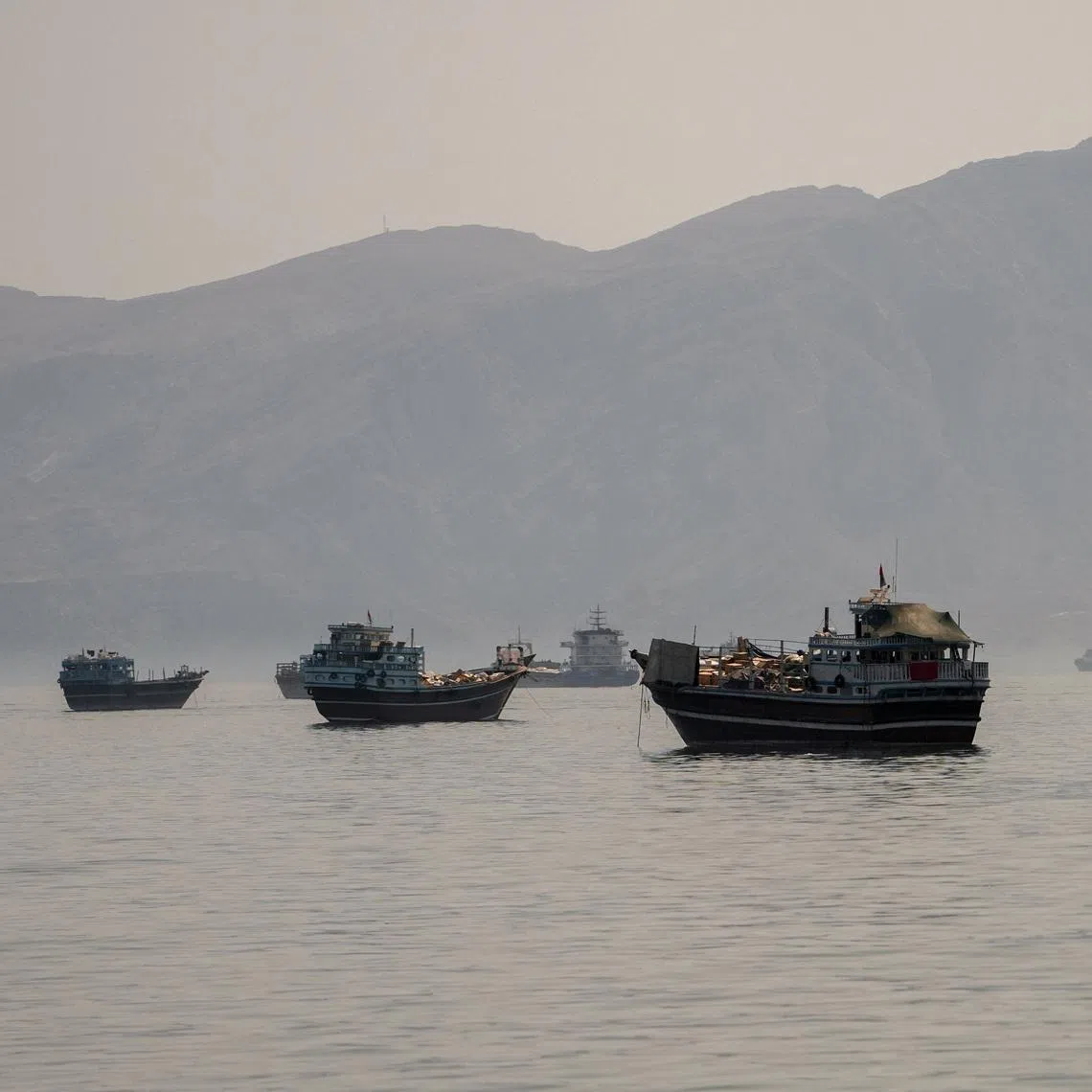 Ships have begun sailing through the Strait of Hormuz under a new scheme by the UN’s shipping agency.