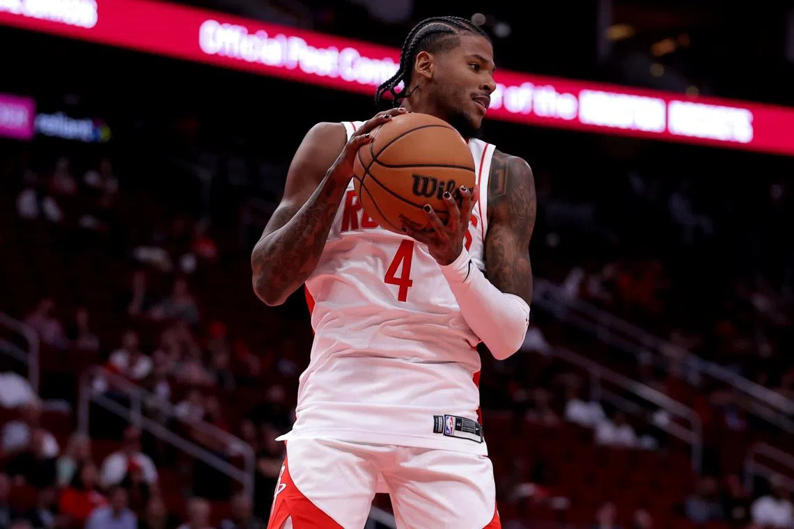 FILE PHOTO: Oct 15, 2024; Houston, Texas, USA; Houston Rockets guard Jalen Green (4) rebounds against the New Orleans Pelicans during the first quarter at Toyota Center. Mandatory Credit: Erik Williams-Imagn Images/File Photo
