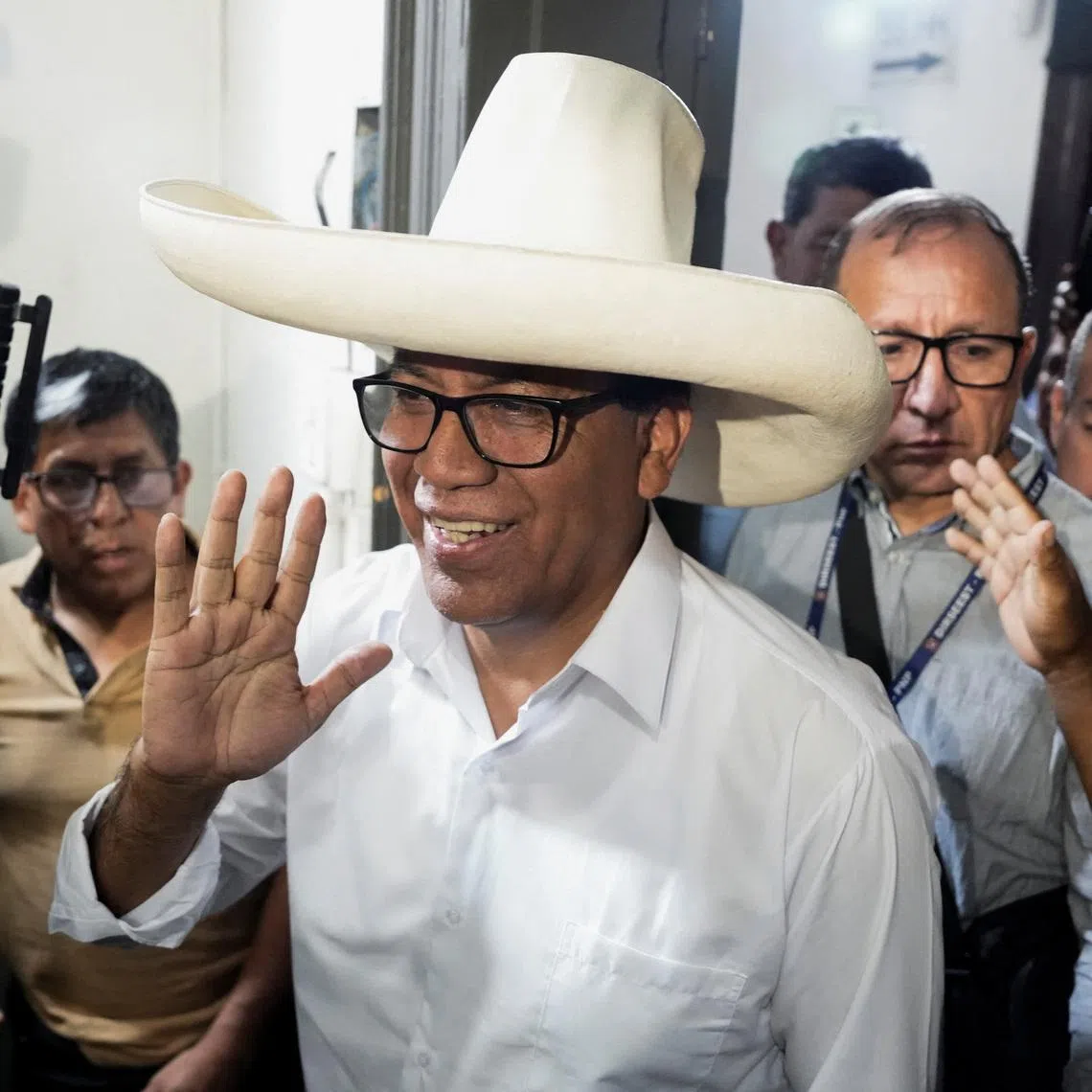 Roberto Sanchez, presidential candidate of the Together for Peru party, attends to speak with members of the media as he waits for the election results after Peru's general election was extended to a second day in some precincts of the capital, in Lima, Peru, April 14, 2026. REUTERS/Angela Ponce