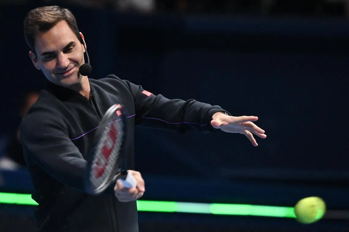 Roger Federer warming up to play during a promotional event at the Ariake Coliseum in Tokyo on Nov 19, 2022.