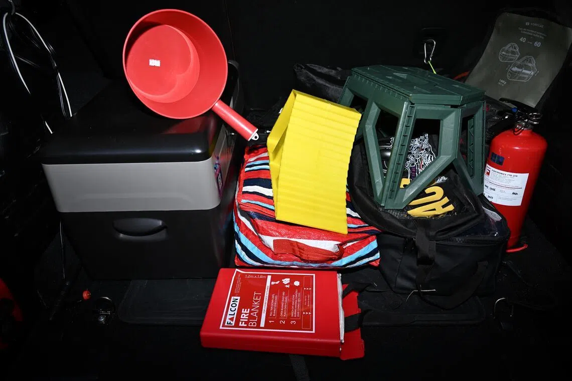 The boot in Leong Khay Mun’s Jeep Wrangler is filled with safety, off-roading and camping equipment.