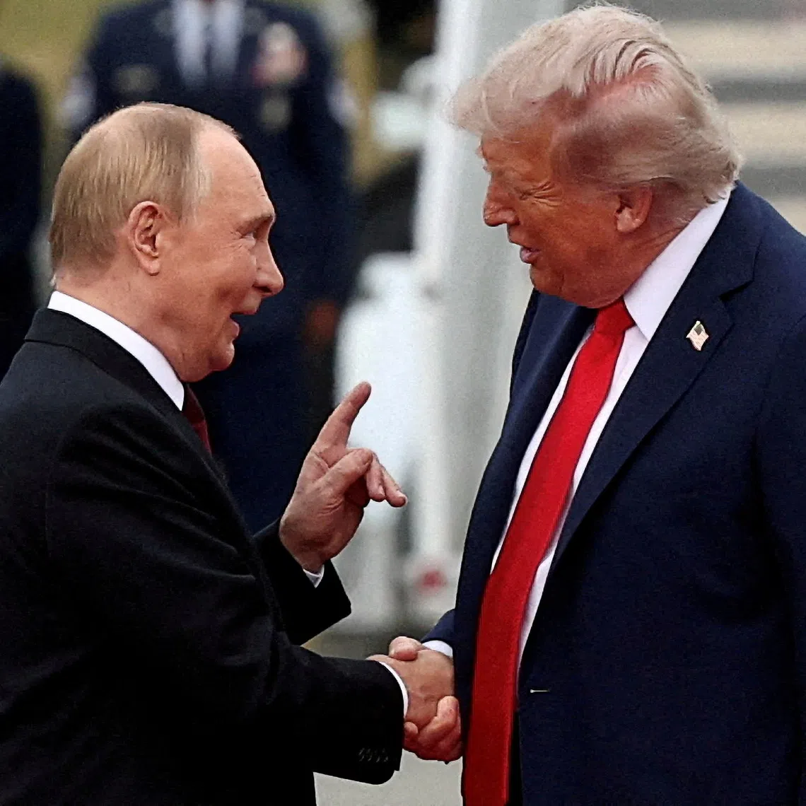 U.S. President Donald Trump shakes hand with Russian President Vladimir Putin at Joint Base Elmendorf-Richardson in Anchorage, Alaska, U.S., August 15, 2025. REUTERS/Kevin Lamarque