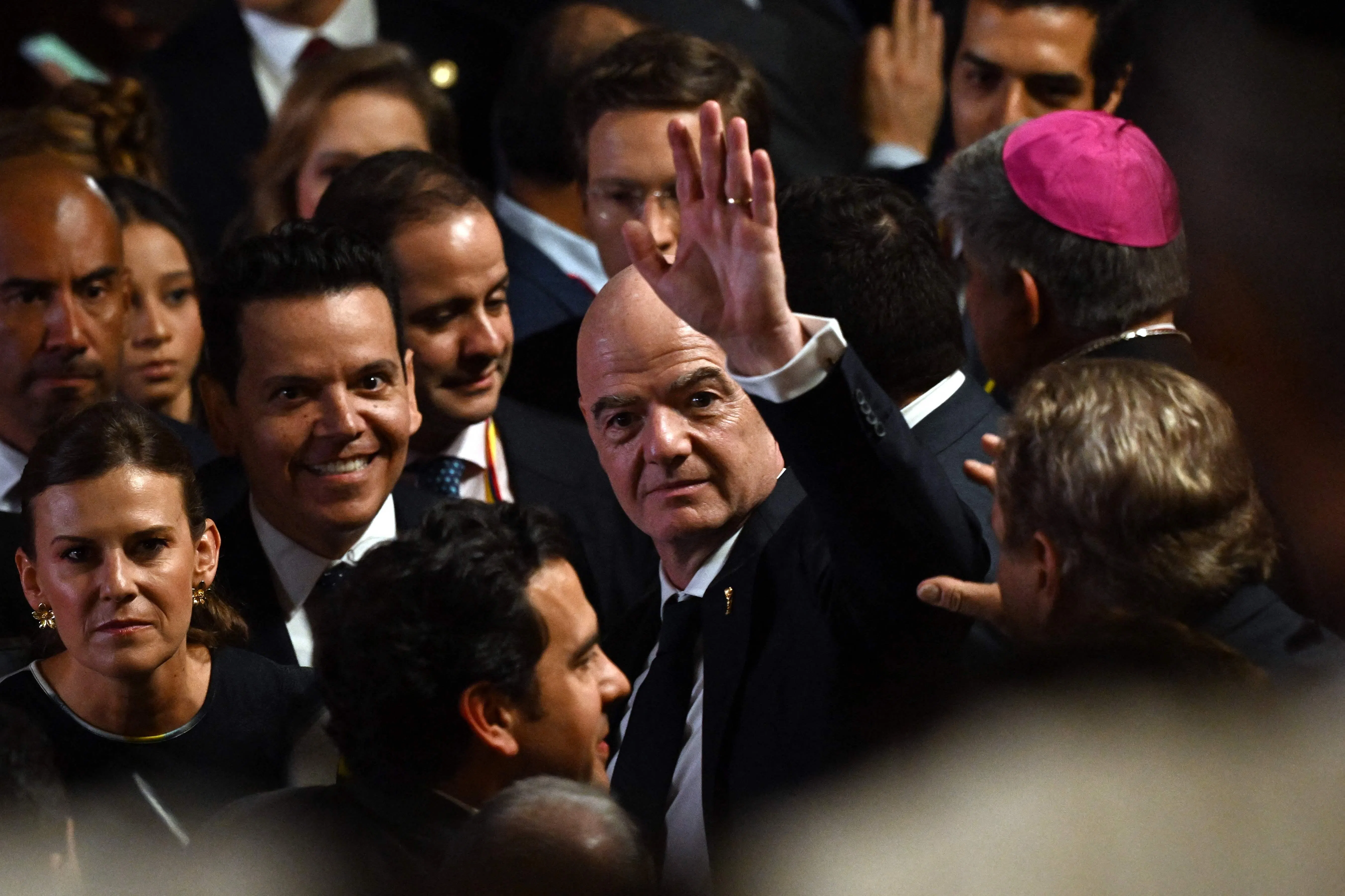 TOPSHOT - FIFA's president Gianni Infantino waves on arrival for the swearing-in ceremony of Colombia's new President Abelardo de la Espriella at Universidad Santiago de Cali in Cali, Colombia, on August 7, 2026. (Photo by Luis ACOSTA / AFP)
