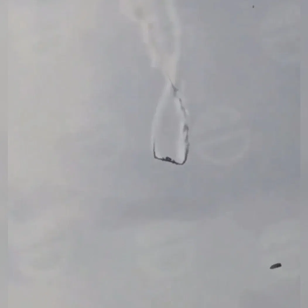 A screenshot from an online video that is said to show the plane falling to the ground.