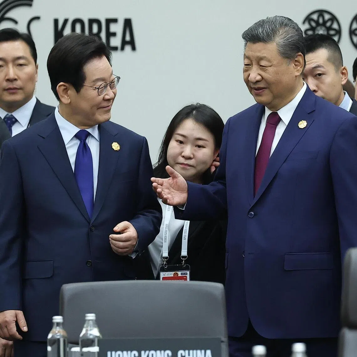 South Korean President Lee Jae Myung (left) and Chinese President Xi Jinping speaking ahead of the opening session of the Apec summit in Gyeongju, South Korea, on Oct 31.