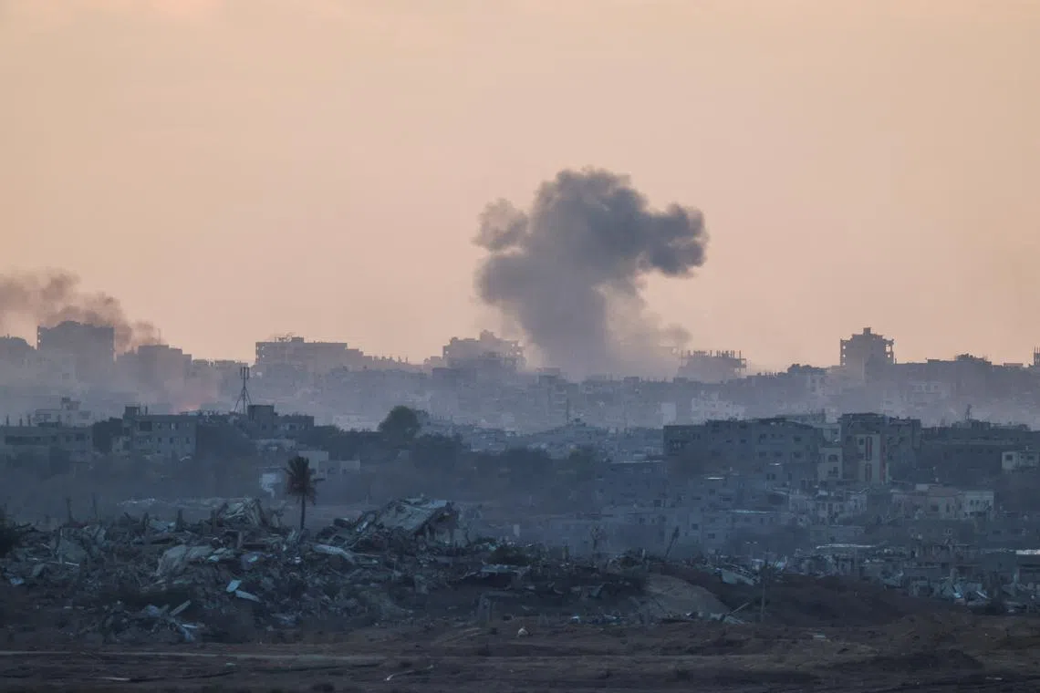 Smoke rises in northern Gaza, amid the ongoing conflict between Israel and Hamas, as seen from Israel, October 7, 2024. REUTERS/Amir Cohen