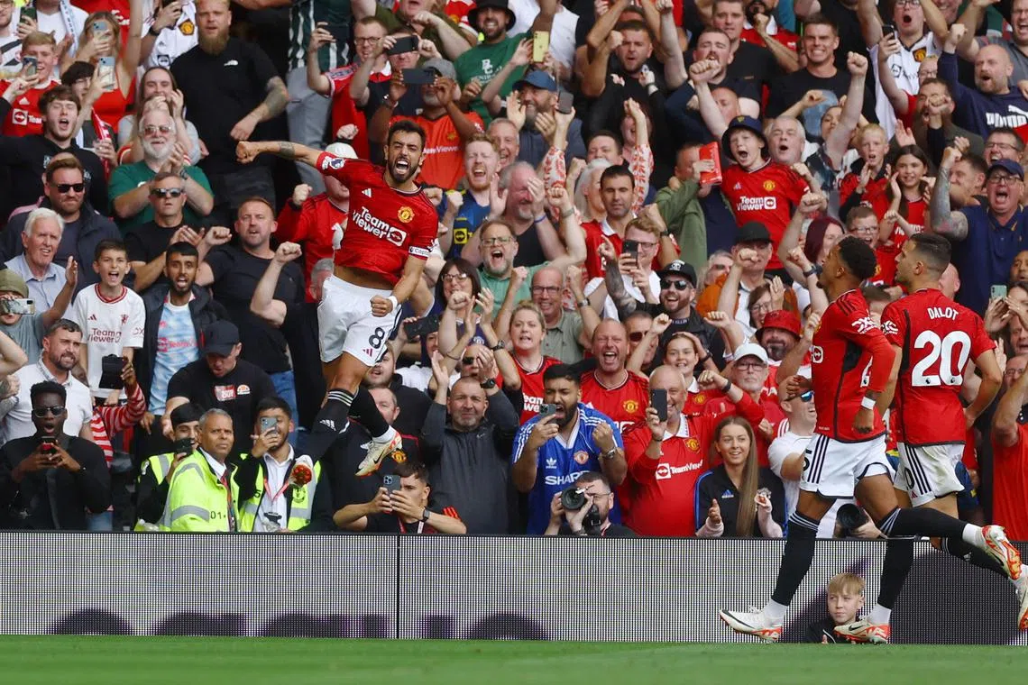 Manchester United captain Bruno Fernandes celebrates after scoring the winning penalty in the 3-2 win over Nottingham Forest.
