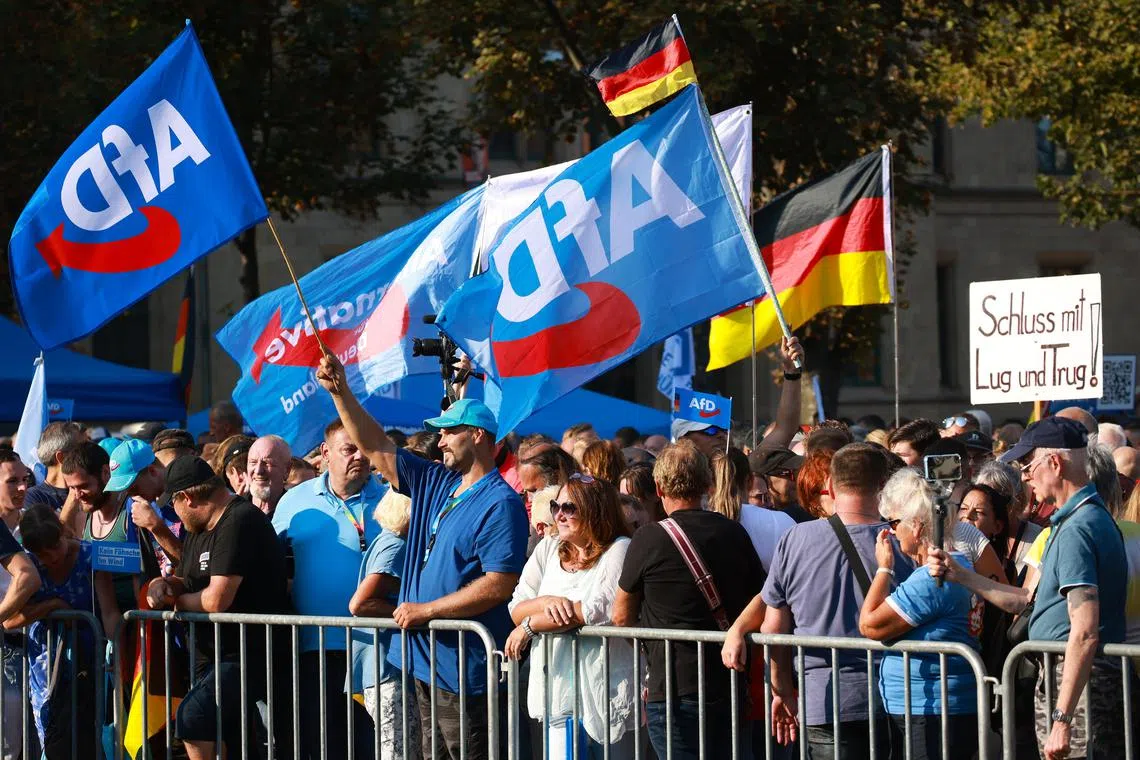 Flag-waving supporters of the Alternative for Germany party during campaigning in August for the Thuringia state elections. 