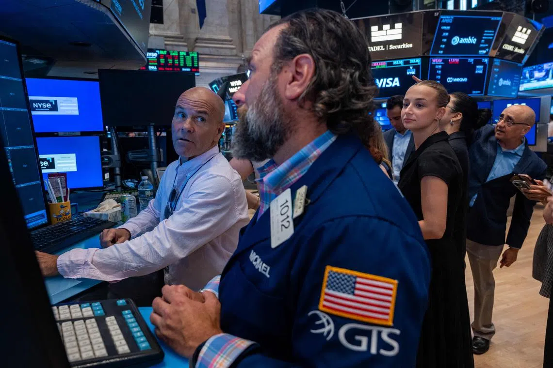 Traders working on the floor of the New York Stock Exchange, in New York City.