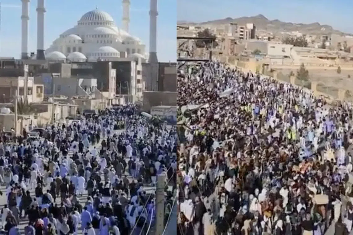 People take part in a protest in Zahedan, Iran, in these screen grabs taken from a social media video.