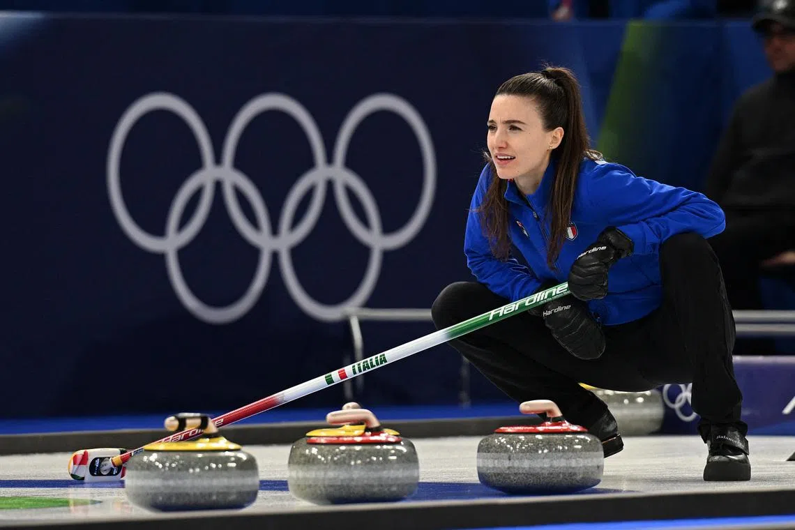 Milano Cortina 2026 Olympics - Curling - Mixed Doubles Semi-final - Italy vs United States of America - Cortina Curling Olympic Stadium, Cortina d'Ampezzo, Italy - February 09, 2026. Stefania Constantini of Italy looks on during a match with Amos Mosaner of Italy against Korey Dropkin of United States and Cory Thiesse of United States REUTERS/Jennifer Lorenzini
