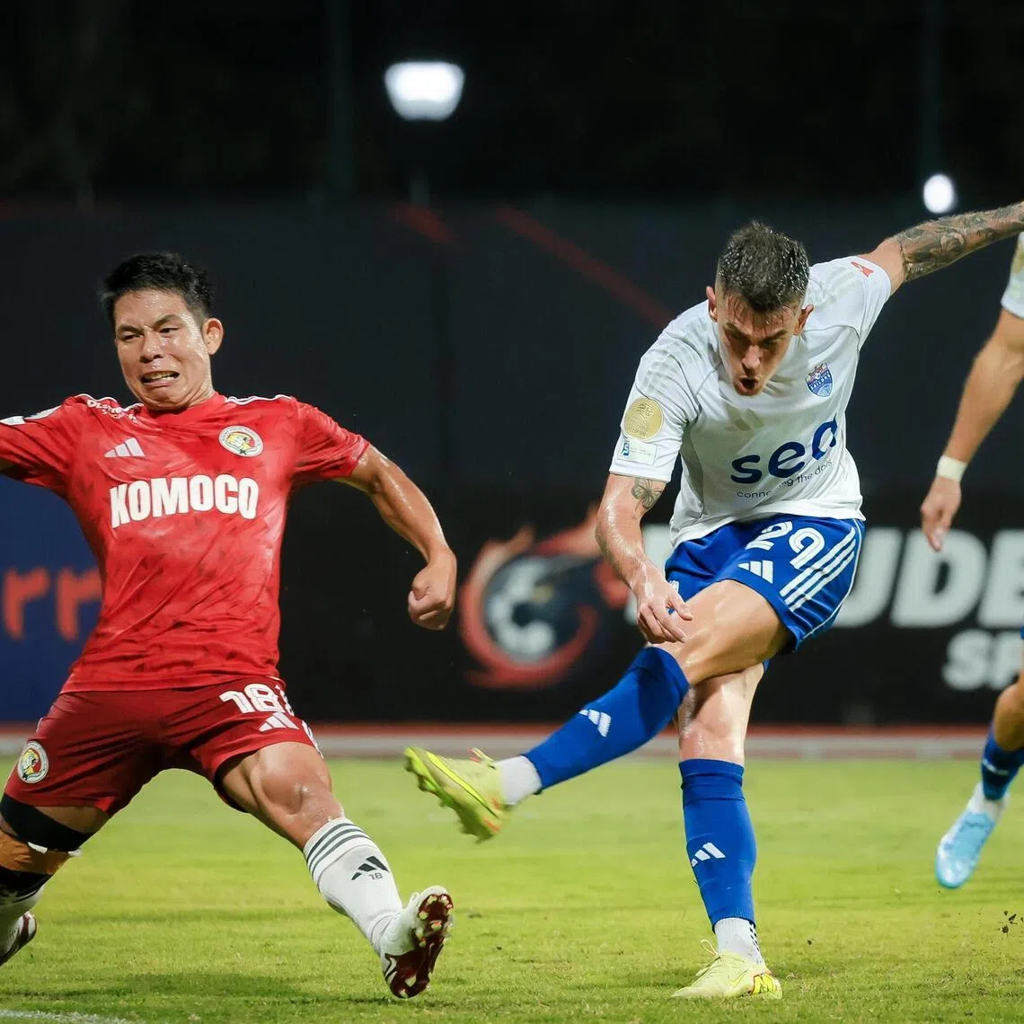 Lion City Sailors’ Diogo Costa (white, 29) scores the first goal against Balestier Khalsa during the Singapore Premier League match at Bishan Stadium on March 15, 2026.