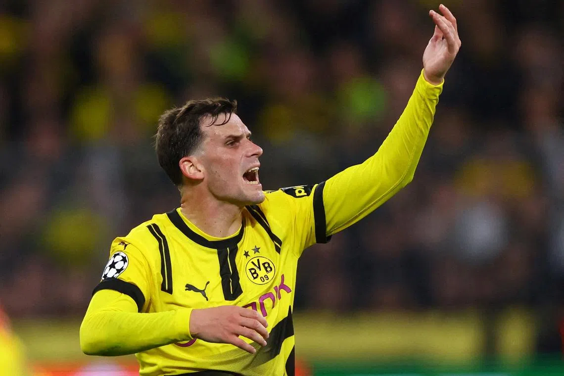 FILE PHOTO: Soccer Football - Champions League - Quarter Final - Second Leg - Borussia Dortmund v FC Barcelona - Signal Iduna Park, Dortmund, Germany - April 15, 2025 Borussia Dortmund's Pascal Gross reacts REUTERS/Thilo Schmuelgen/File Photo