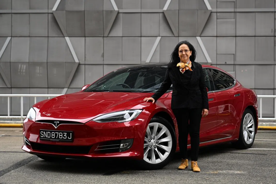 ST20240103_202434588321 ycmycar Chong Jun Liang
Anju Abrol, CEO and Head of Wholesale Banking APAC at ING, with her Tesla Model S photographed on January 3, 2023. ****** Me and My Car: The CEO and head of wholesale banking in Asia-Pacific for ING Bank drives a rare parallel-imported Tesla Model S. She learnt how to drive in a Hindustan Ambassador in Calcutta and she has lived in Sydney, Hong Kong and New York.