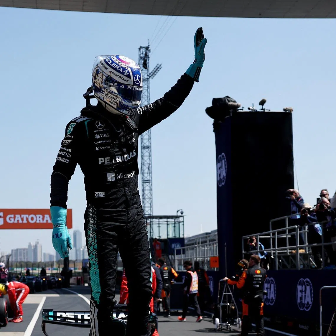 Formula One F1 - Chinese Grand Prix - Shanghai International Circuit, Shanghai, China - March 14, 2026 Mercedes' George Russell celebrates after winning the sprint race REUTERS/Jakub Porzycki