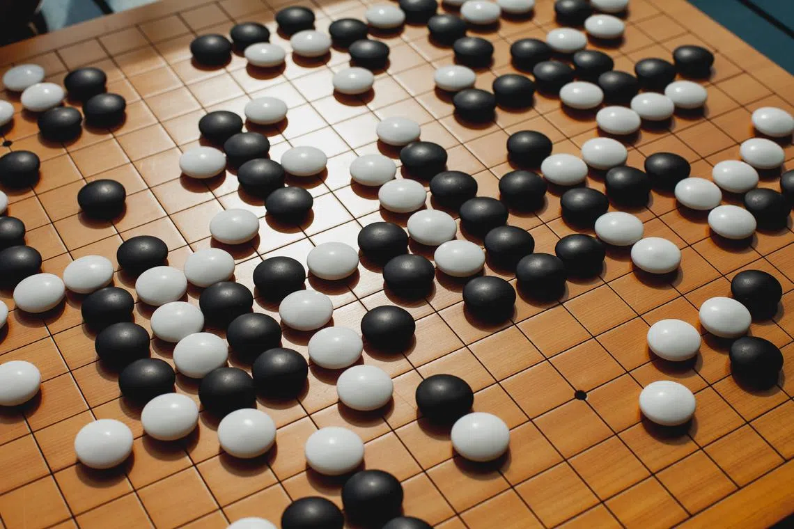 A human player has comprehensively defeated a top-ranked AI system at the board game Go.