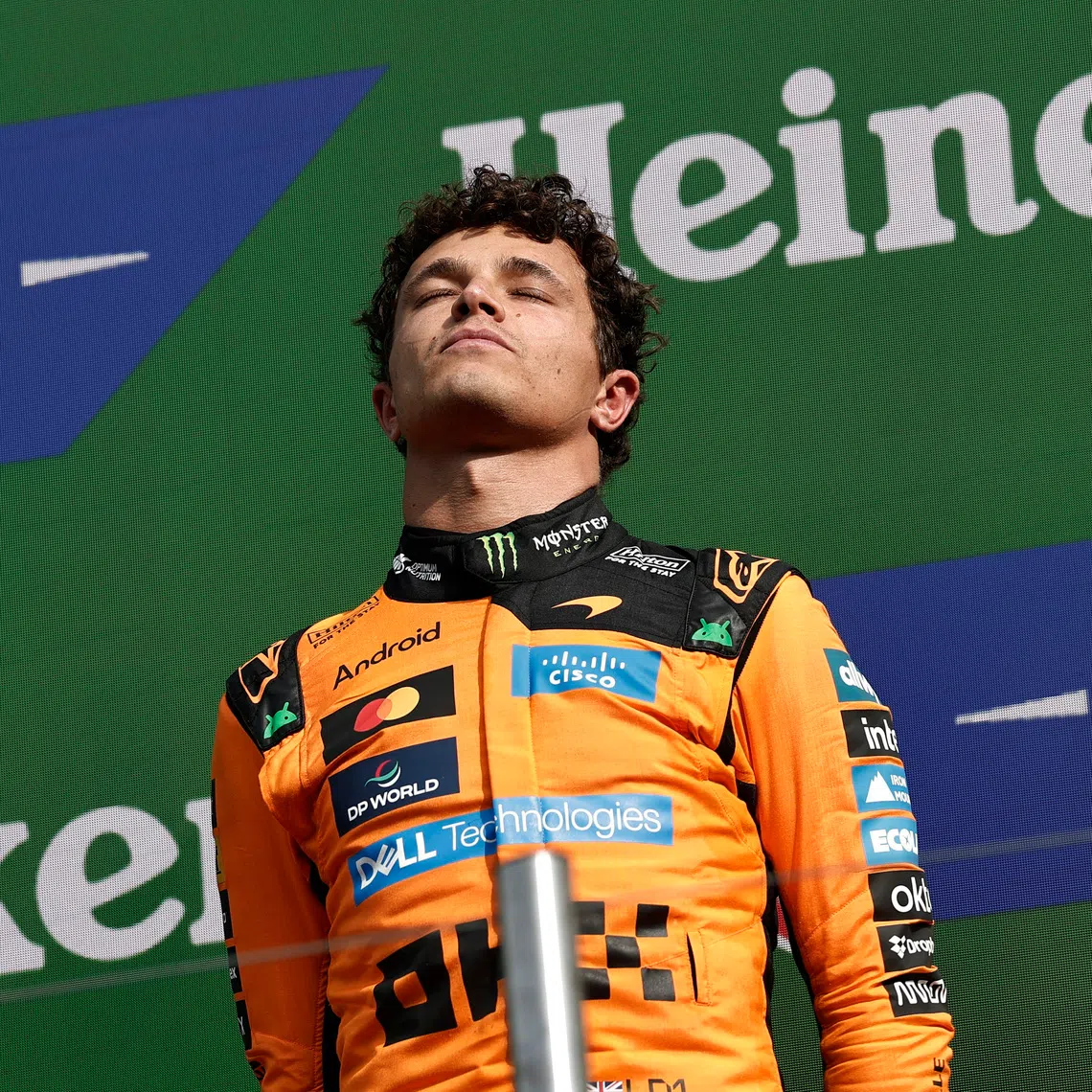 McLaren’s Lando Norris celebrates on the podium after winning the Dutch Grand Prix.
