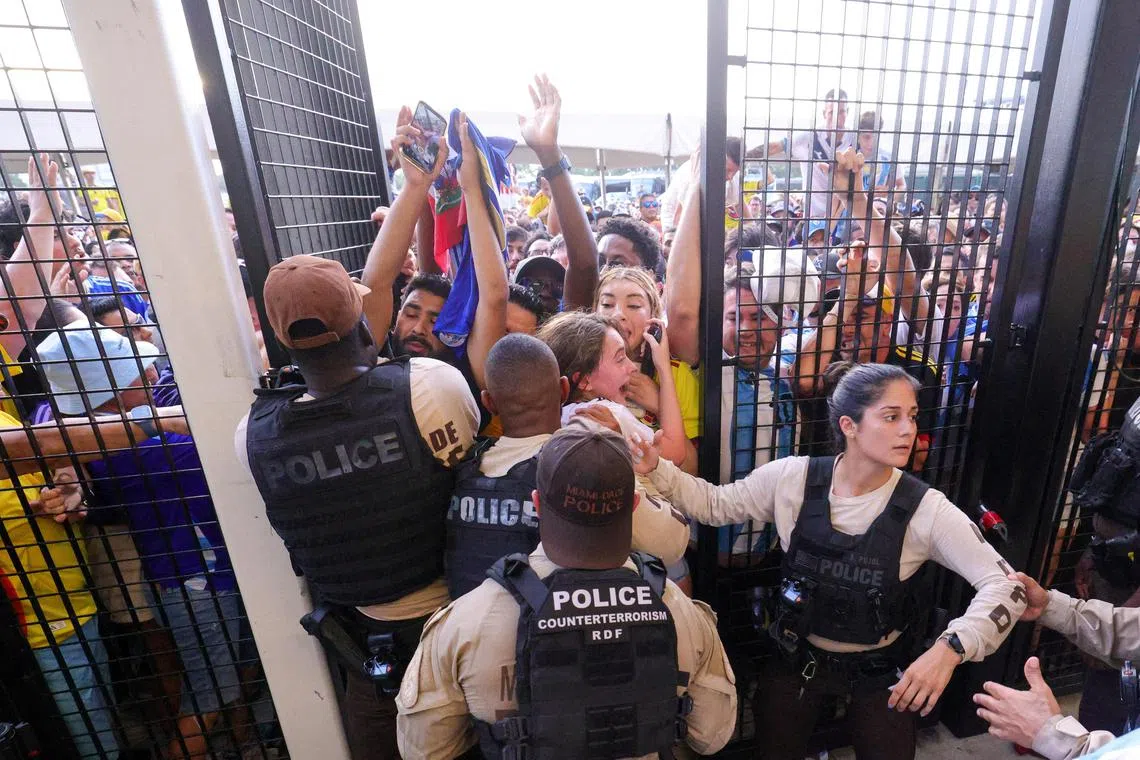 Jul 14, 2024; Miami, FL, USA;  fans rush the gates before the Copa America Final match between Argentina and Colombia at Hard Rock Stadium. Mandatory Credit: Nathan Ray Seebeck-USA TODAY Sports     TPX IMAGES OF THE DAY     