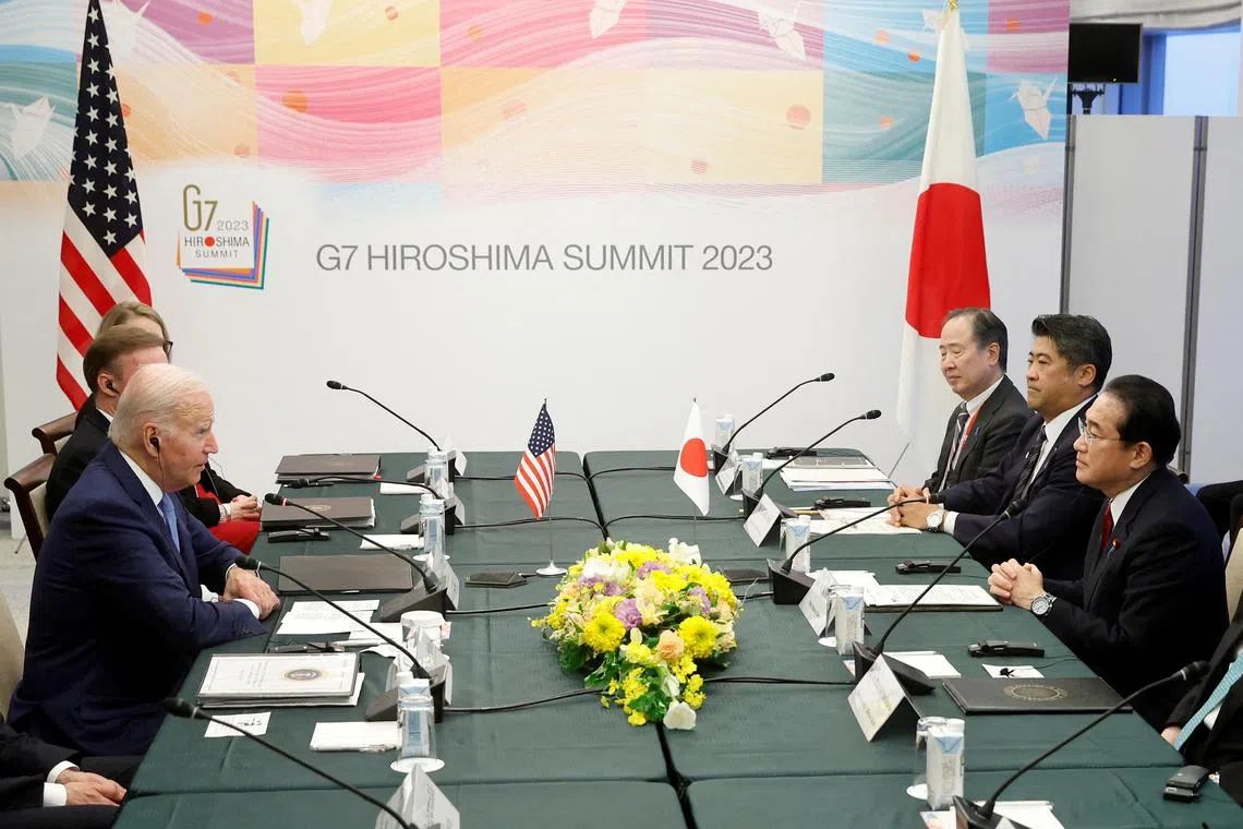 US President Joe Biden and Japan's Prime Minister Fumio Kishida attend a bilateral meeting ahead of the G7 leaders' summit in Hiroshima, Japan, on May 18.