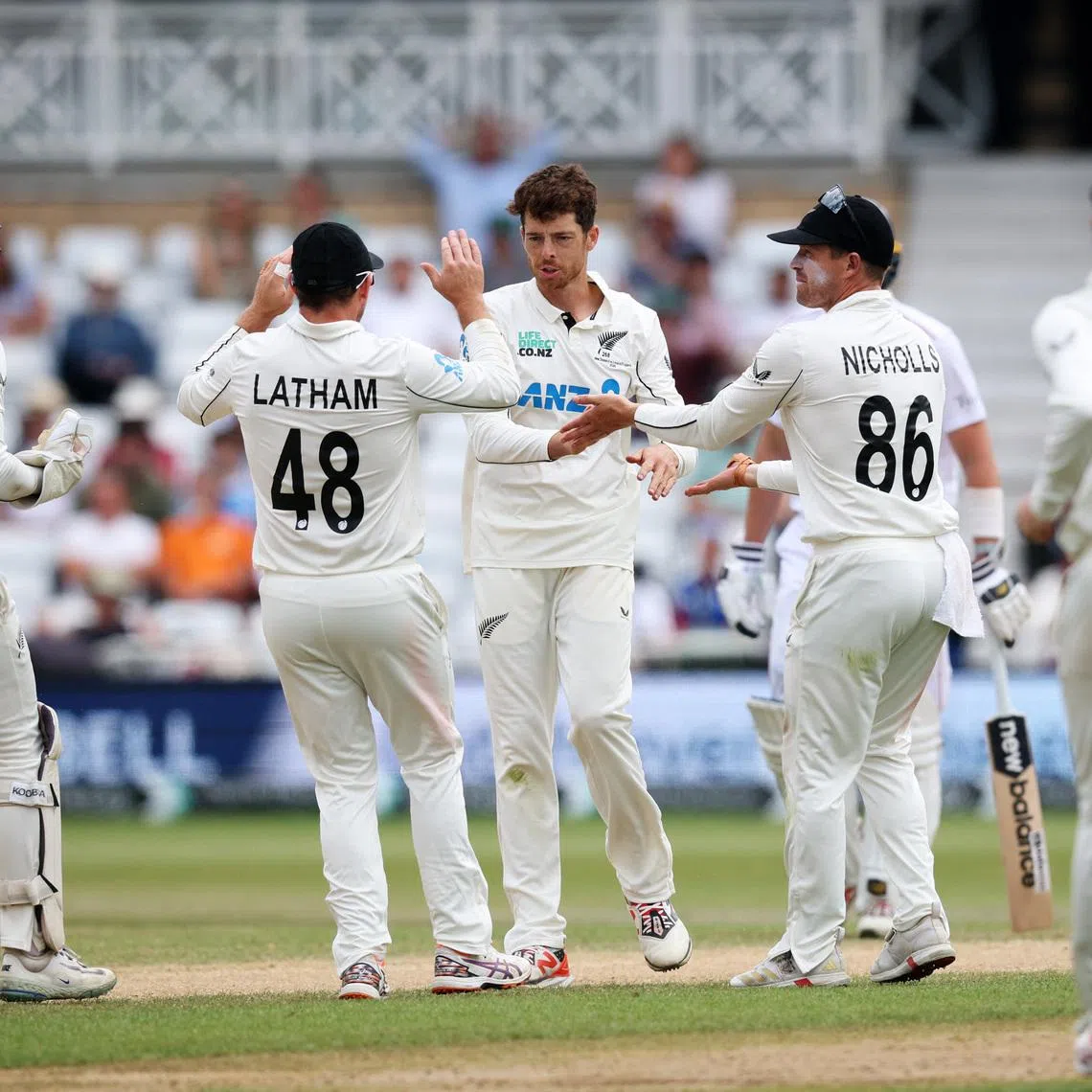 Cricket - England v New Zealand - Third Test - Trent Bridge Cricket Ground, Nottingham, Britain - June 29, 2026 New Zealand's Mitchell Santner celebrates after taking the lbw wicket of England's Gus Atkinson with teammates Action Images via Reuters/Andrew Boyers