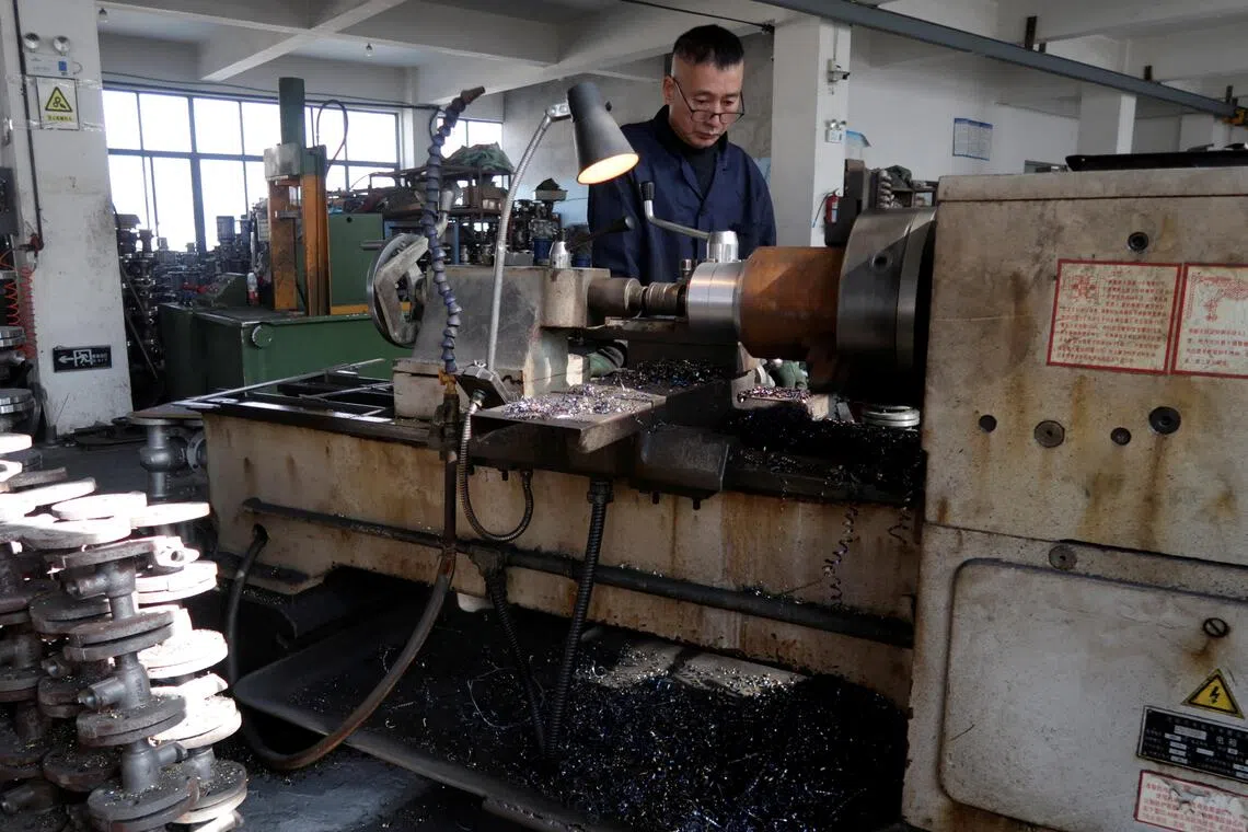 China’s factories rev up, but slower consumption fuels concerns