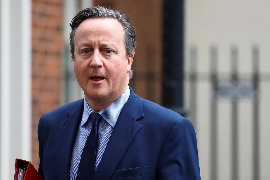 FILE PHOTO: British Foreign Secretary David Cameron walks, at Downing Street in London, Britain, March 13, 2024. REUTERS/Hannah McKay/File Photo
