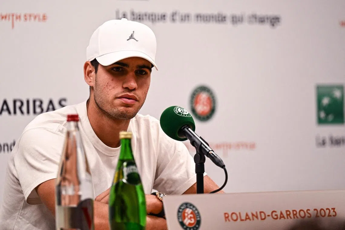 Spain's Carlos Alcaraz speaks during a press conference, after losing to Serbia's Novak Djokovic.
