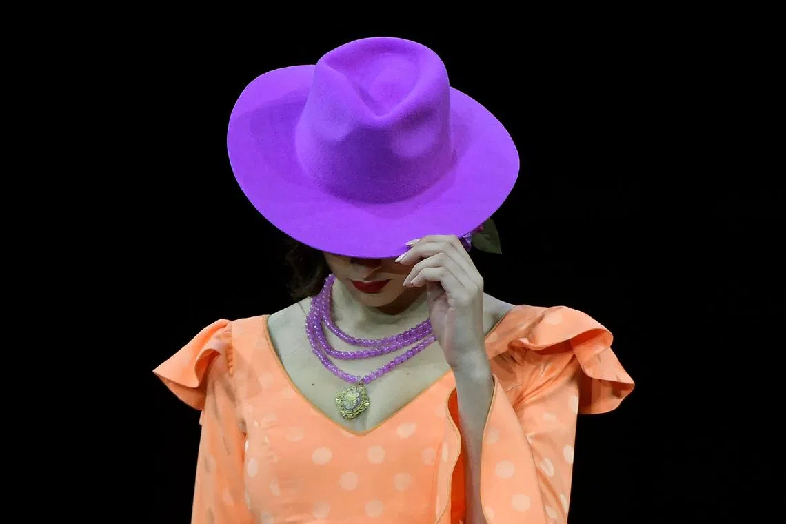 A model presents a creation by Maricruz Montecarlo during the Simof 2023 (International Flamenco Fashion Show) in Sevilla on Jan 29, 2023. 