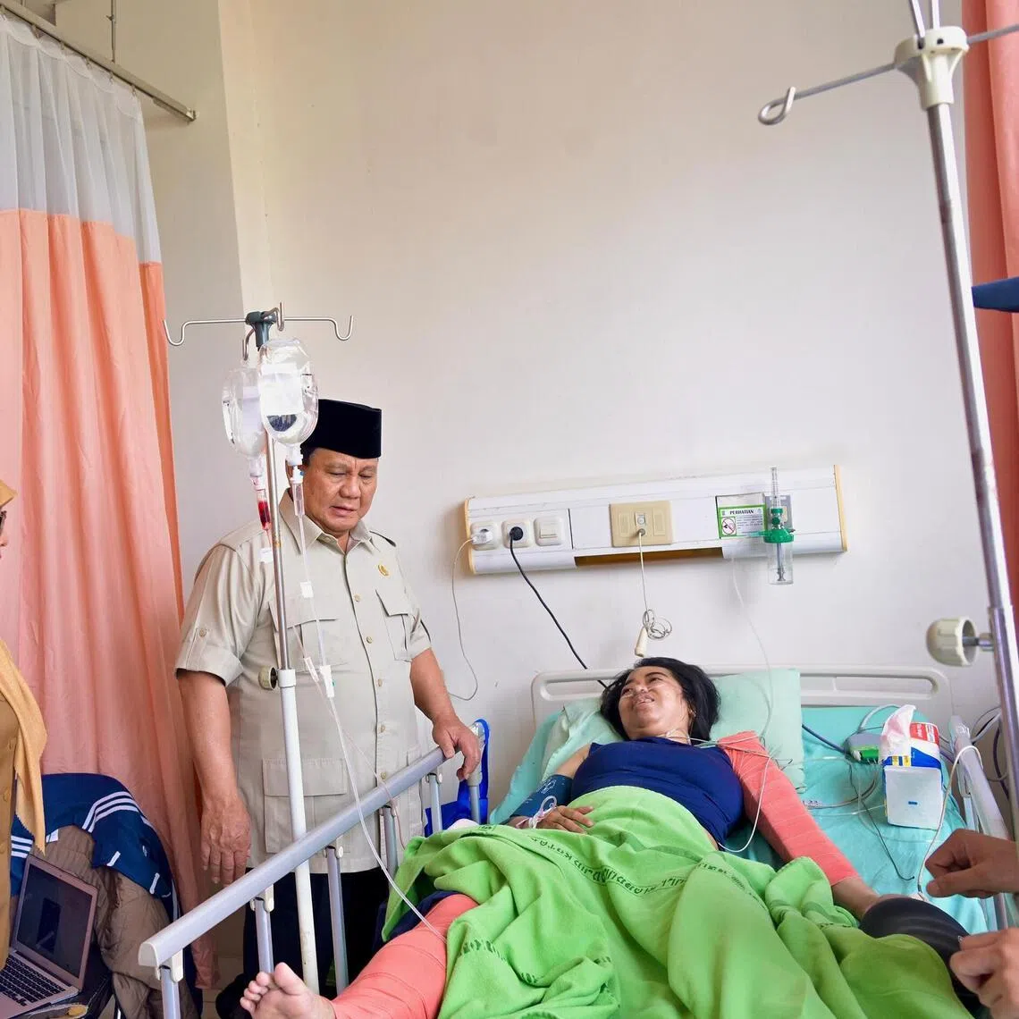 Indonesian President Prabowo Subianto visiting the victims of the April 27 train crash at Bekasi Regional Public Hospital in Bekasi City, outside Jakarta, on April 28. 