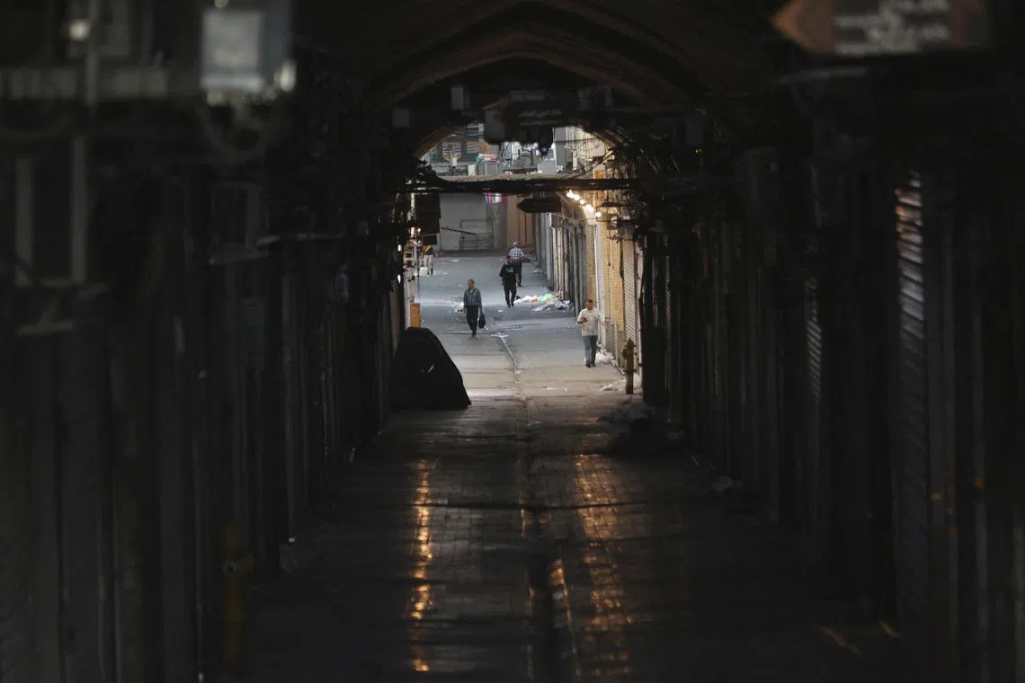 Closed shops in the Tehran Bazaar following the Israeli strikes on Iran, in the centre of Tehran, Iran, June 15, 2025. Majid Asgaripour/WANA (West Asia News Agency) via REUTERS   ATTENTION EDITORS - THIS PICTURE WAS PROVIDED BY A THIRD PARTY