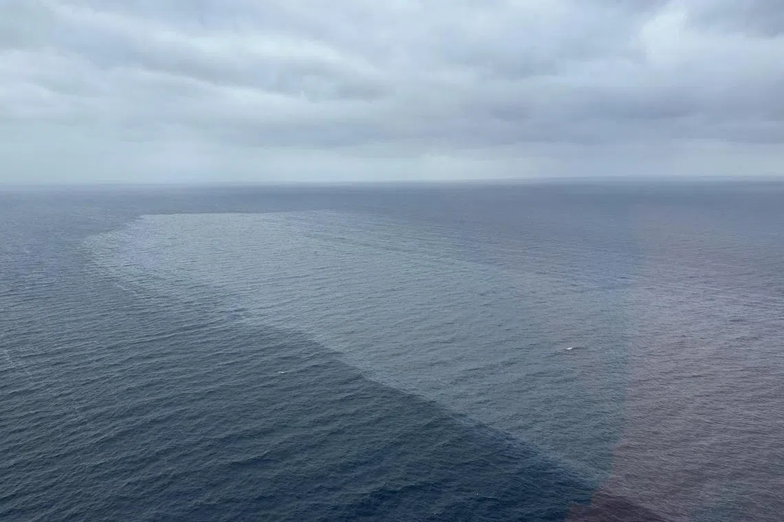 A motor tanker carrying thousands of industrial oil triggers a diesel spill off the coast of the island province of Oriental Mindoro in the Philippines on February 28, 2023.