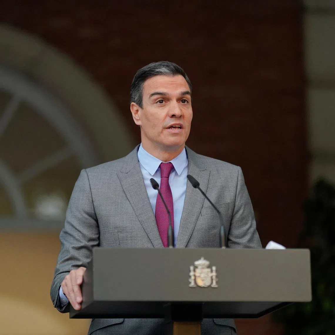 FILE PHOTO: Spain's Prime Minister Pedro Sanchez delivers a statement as he announces pardons for jailed Catalan separatist leaders, at Moncloa Palace in Madrid, Spain, June 22, 2021. REUTERS/Juan Medina/File Photo
