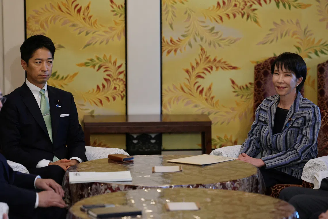 Ishin co-head Fumitake Fujita (left) meeting LDP chief Sanae Takaichi in Tokyo on Oct 17.