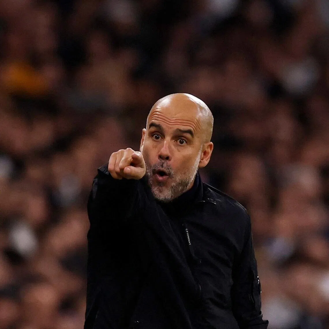 Pep Guardiola's Manchester City are just two points behind Premier League leaders Arsenal.