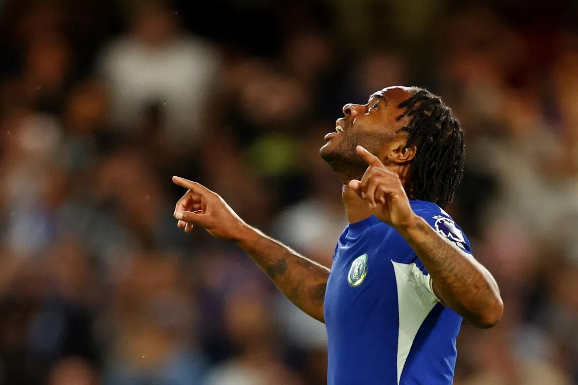 helsea's Raheem Sterling celebrates after scoring their first goal against Luton Town.