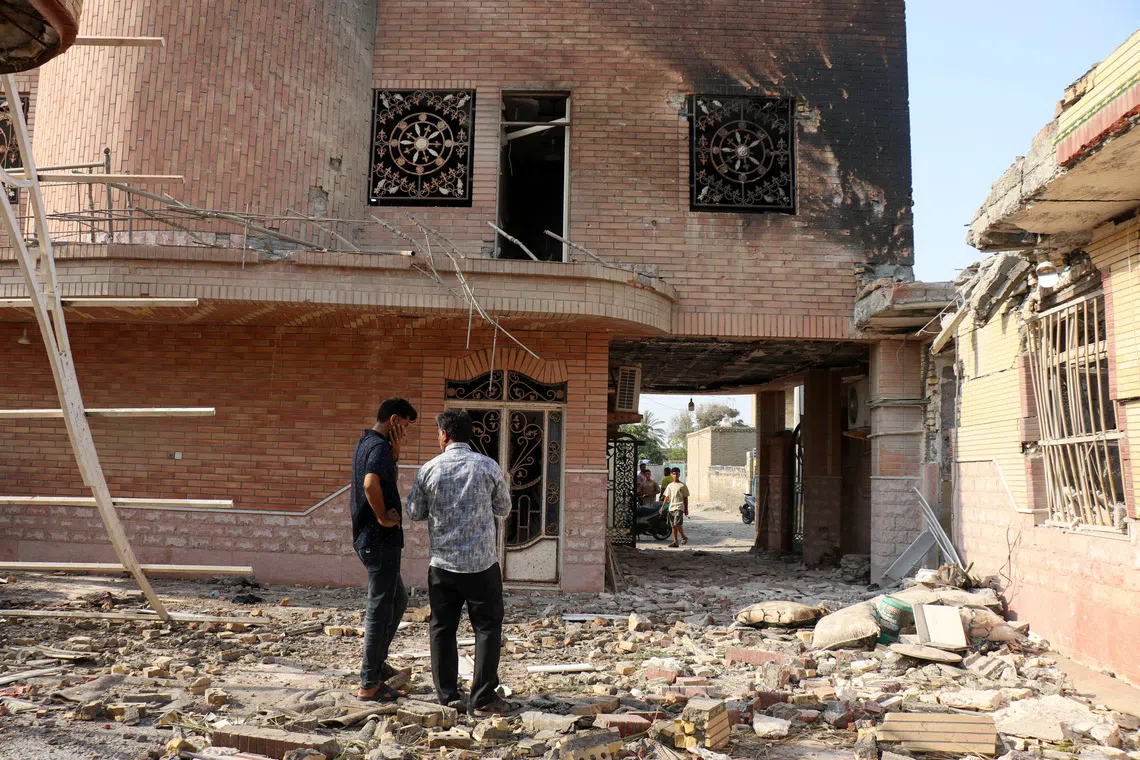 Rubble around homes in the village of Kuhestak, in Iran’s Sirik county, after a reported US strike.