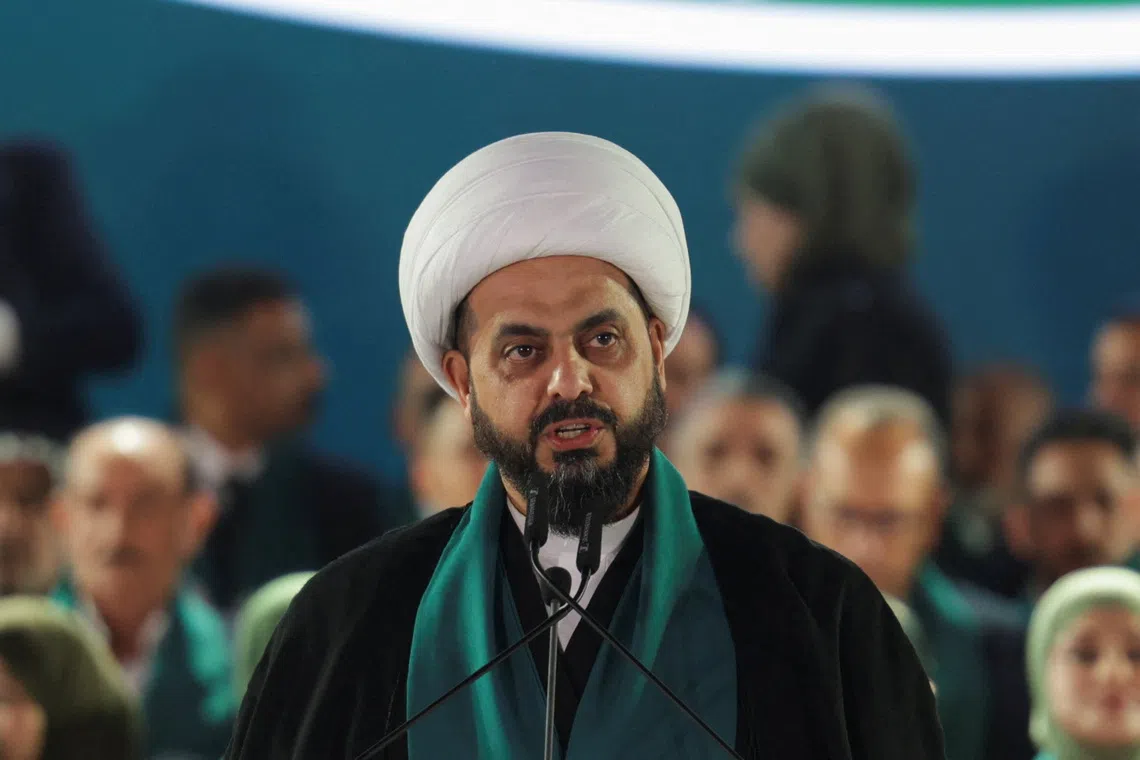 Qais al-Khazali, head of the Asaib Ahl al-Haq group, speaks during a rally to present the Sadiqoon Movement ahead of parliamentary elections, in Baghdad, Iraq, October 10, 2025. REUTERS/Ahmed Saad