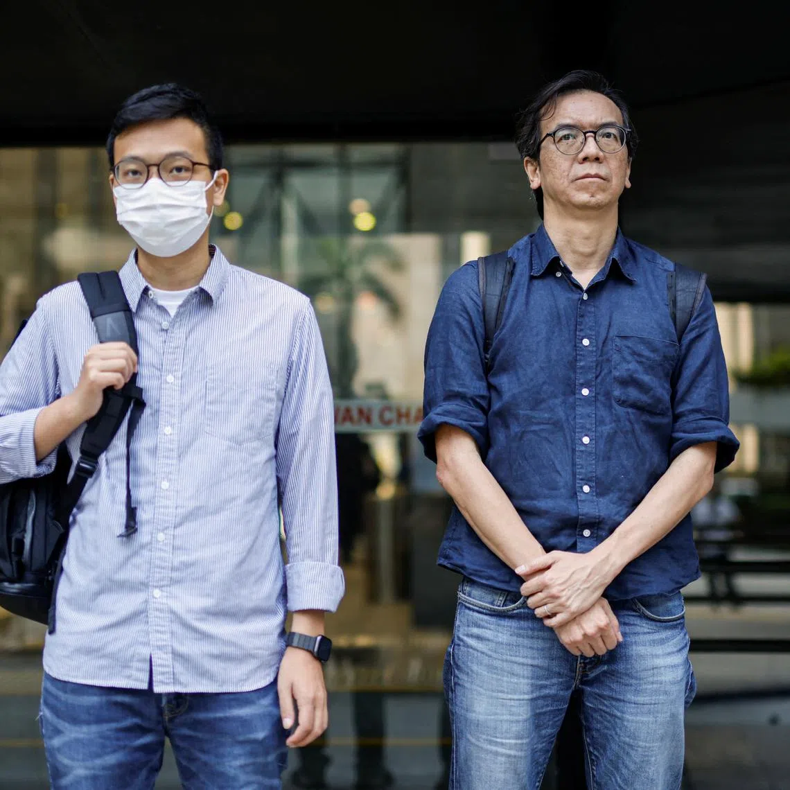 FILE PHOTO: Chung Pui-kuen, former chief editor of the now-shuttered Stand News, and Patrick Lam, former acting chief editor, leave the District Court during the hearing on charges of conspiring to publish seditious publications, in Hong Kong, China on June 27, 2023. REUTERS/Tyrone Siu/File Photo