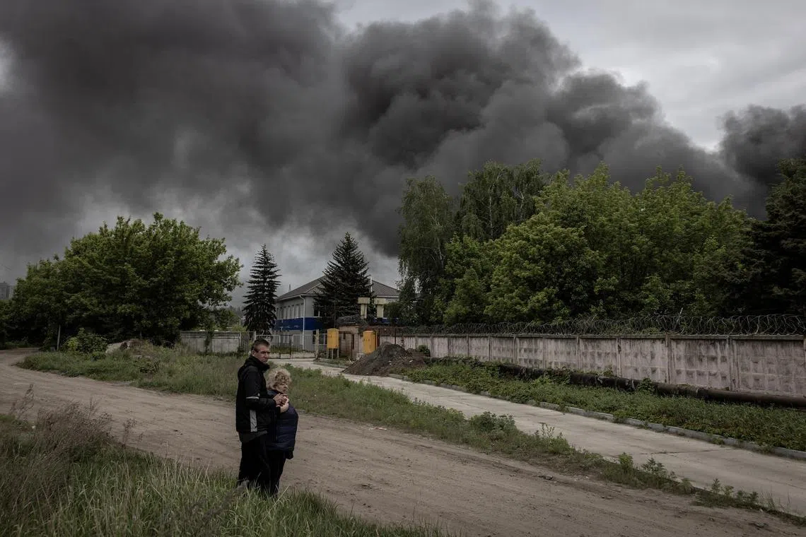 Smoke rising from the site of a strike on industrial buildings in Kharkiv, Ukraine, in May 2024.