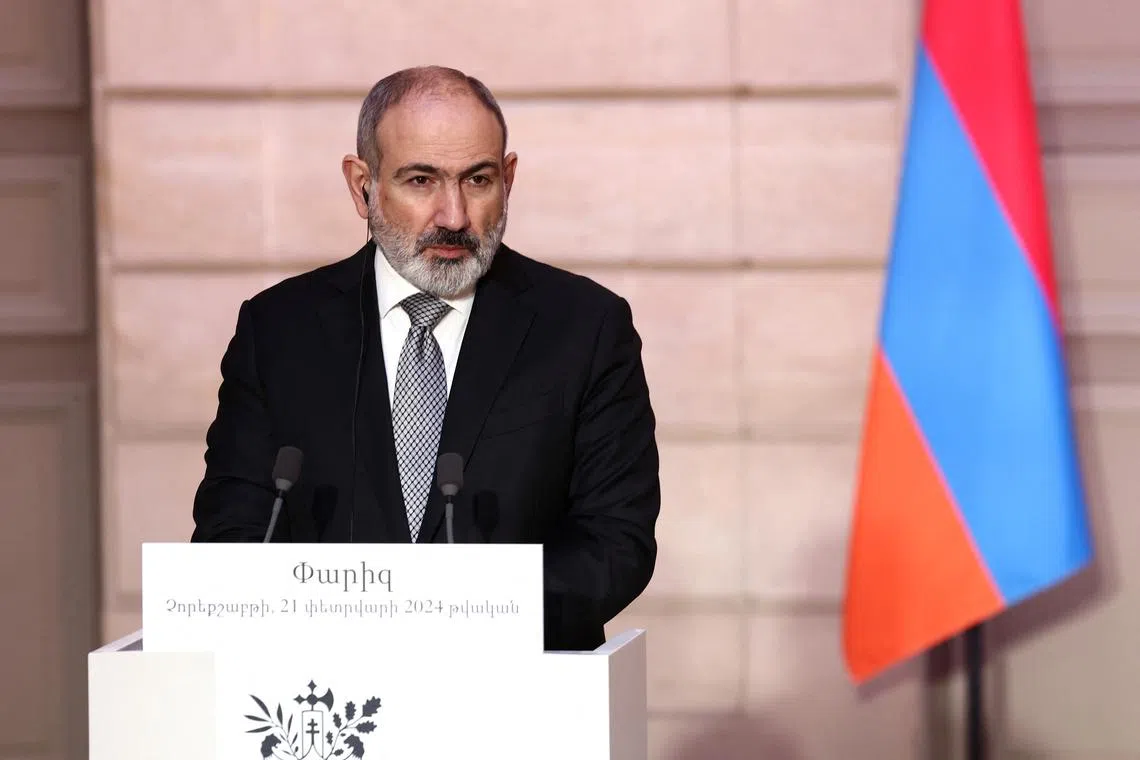 FILE PHOTO: Armenian Prime Minister Nikol Pashinyan attends a joint press conference with French President Emmanuel Macron (not seen) as part of a meeting on the sidelines of the entry ceremony for Missak Manouchian and his resistance comrades into the Pantheon, at the Elysee Palace in Paris, France, February 21, 2024. REUTERS/Stephanie Lecocq/Pool/File photo