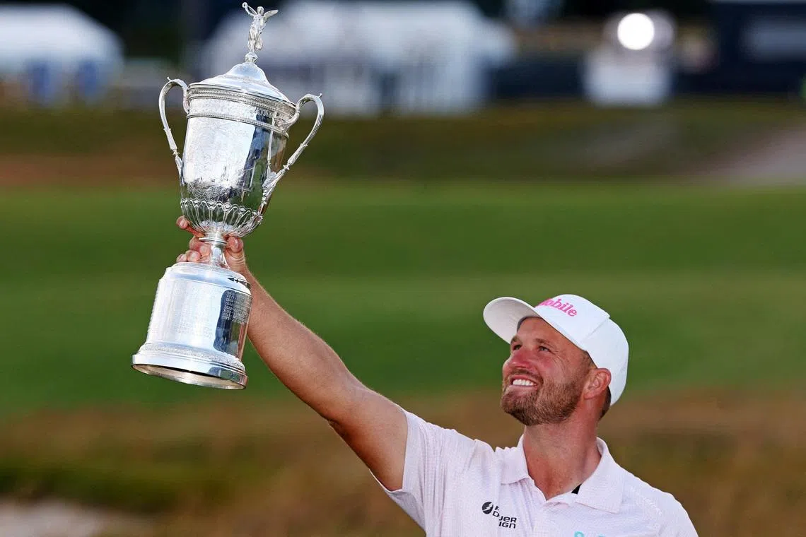 Wyndham Clark celebrating after winning the US Open golf tournament at Shinnecock Hills Golf Club in Southampton, New York, on June 21.