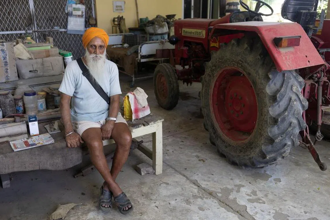 Himmat Singh Nijjar, 79, uncle of Sikh separatist leader Hardeep Singh Nijjar, sits inside his house after an interview with Reuters at village Bharsingpura, in Jalandhar district of the northern state of Punjab, India, September 21, 2023. REUTERS/Adnan Abidi