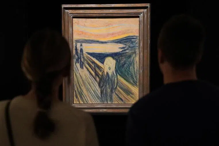 Visitors look at a version of Edvard Munch’s artwork ‘The Scream’ at the Munch Museum in Oslo, Norway, October 29, 2024.