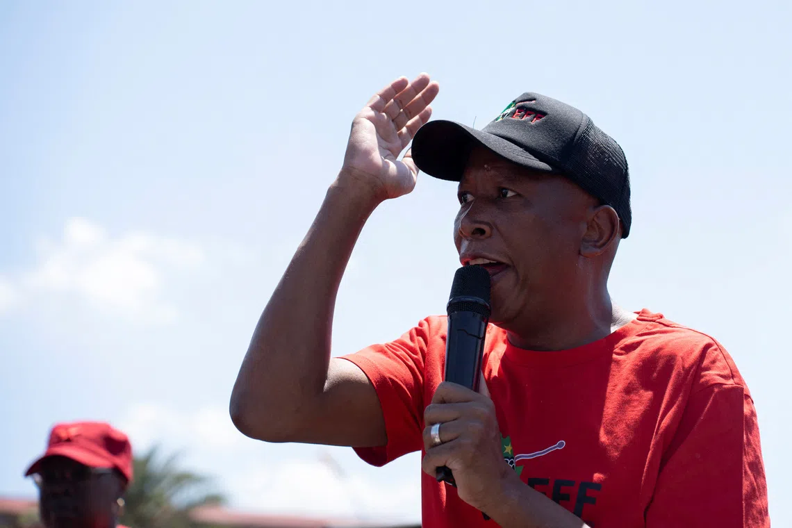 Julius Malema, the leader of the Economic Freedom Fighters (EFF), addresses supporters as he leads a protest towards the Constitutional Court, where the political party is challenging the National Assembly’s rejection of a report that could have led to impeachment proceedings against President Cyril Ramaphosa due to the Phala Phala scandal at his private game farm in Johannesburg, South Africa, November 26, 2024. REUTERS/Ihsaan Haffejee