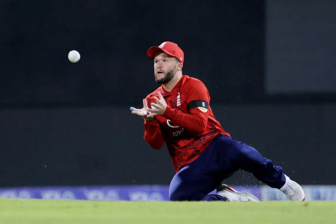 Cricket - Third Twenty20 International - Sri Lanka v England - Pallekele International Cricket Stadium, Kandy, Sri Lanka - February 3, 2026 England's Ben Duckett takes a catch to dismiss Sri Lanka's Kamil Mishara off the bowling of England's Luke Wood REUTERS/Lahiru Harshana