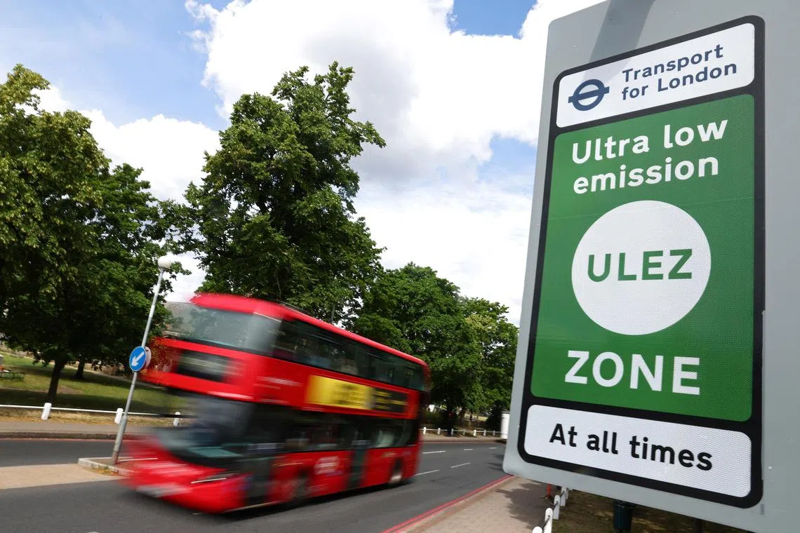 Signage indicates the boundary of London's Ultra Low Emissions Zone (ULEZ) zone along the North Circular Road ahead of proposed upcoming expansion, in London, Britain, June 26, 2023. REUTERS/Toby Melville