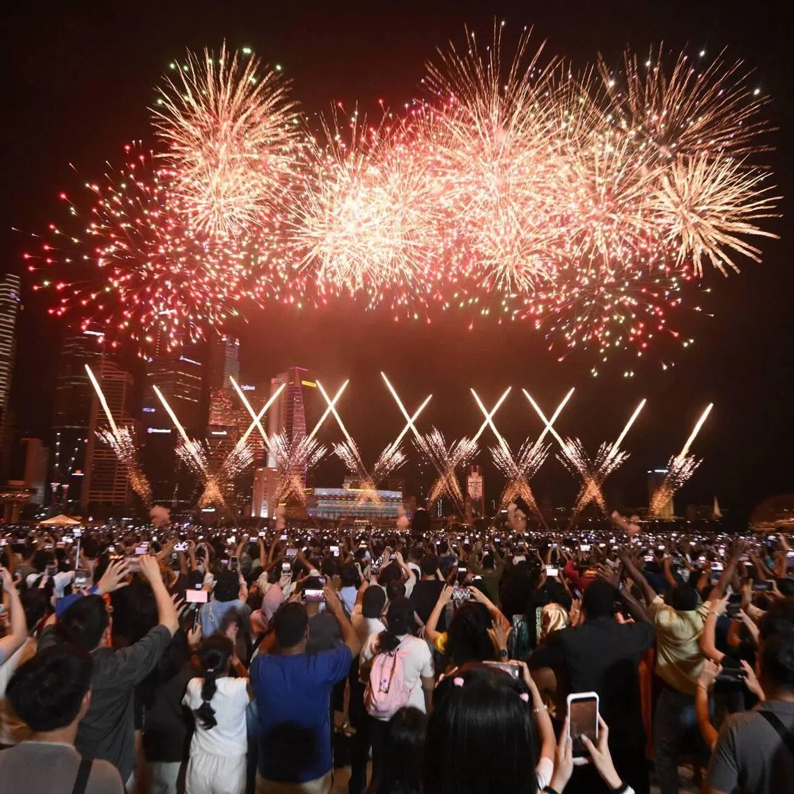 Crowds welcoming the new year during the fireworks display in Marina Bay on Jan 1, 2026.