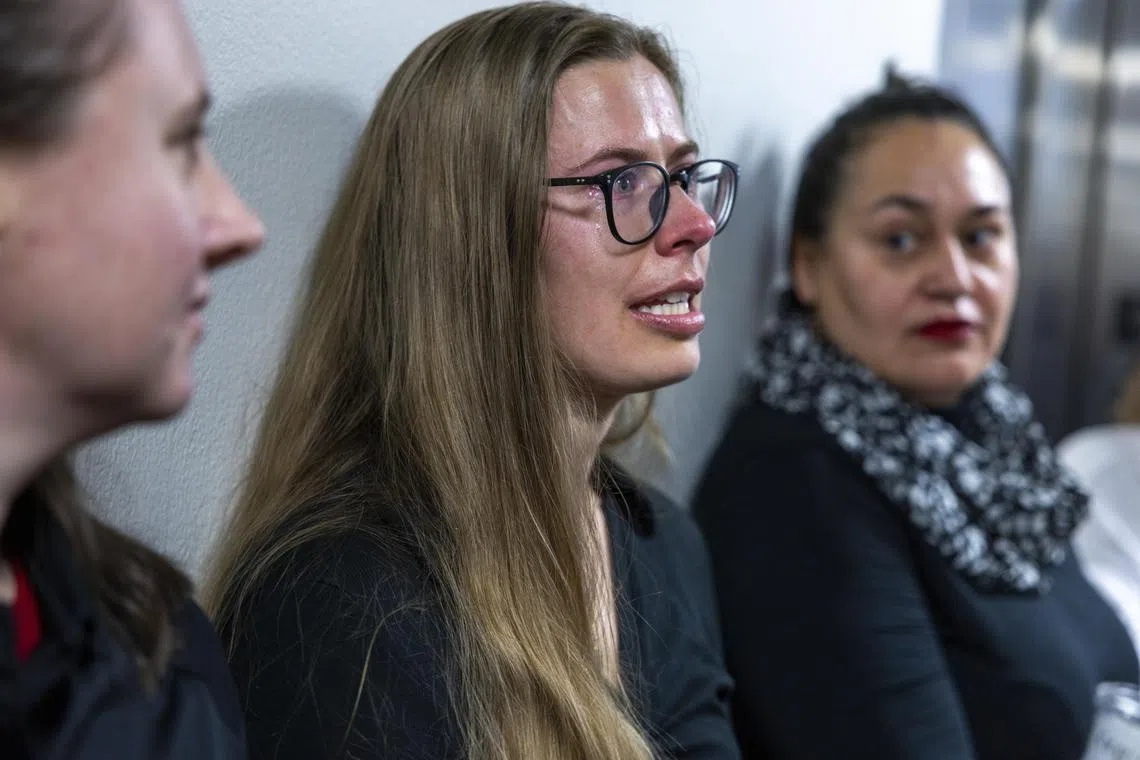 Ms Sydney Smith, a federal worker fired from the US Forest Service by Elon Musk's Department of Government Efficiency, shares her experience with other terminated federal workers, during a protest  on Capitol Hill in Washington, on Feb 25.