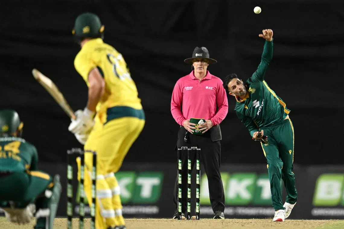 South Africa's Keshav Maharaj bowling in the first ODI cricket match against Australia at Cazaly's Stadium in Cairns on Aug 19, 2025.